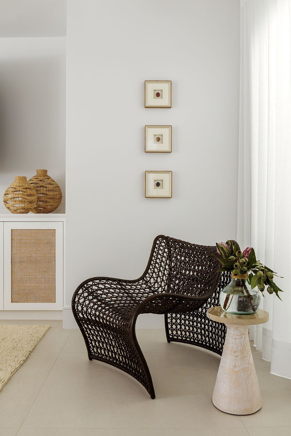 Contemporary Garden House, Boca Raton, woven accent chair and styled vignette